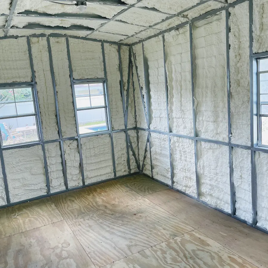 Closed-cell spray foam insulation applied to wall cavities in a residential project in Anthem